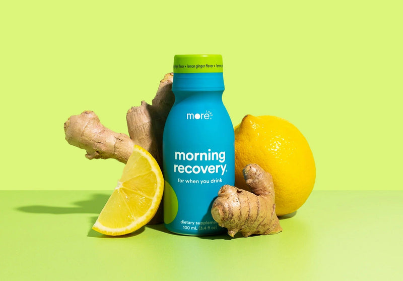 More Labs Morning Recovery bottle with lemon and ginger on a bright green background.