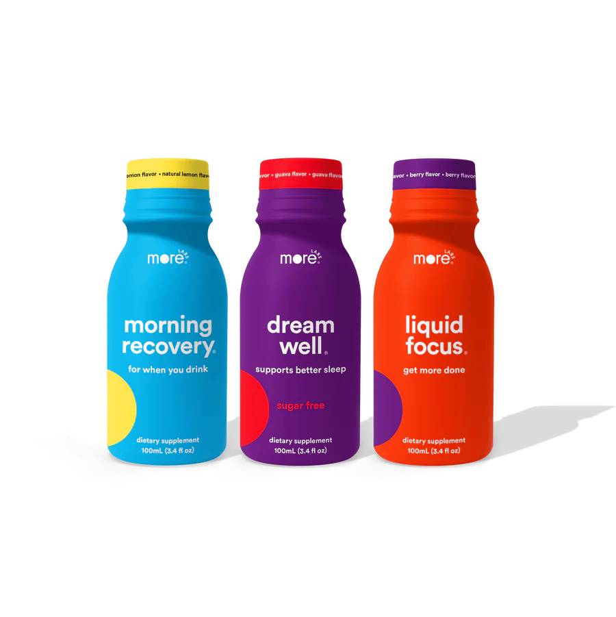 Three colorful bottles of 'more labs' dietary supplements on a white background