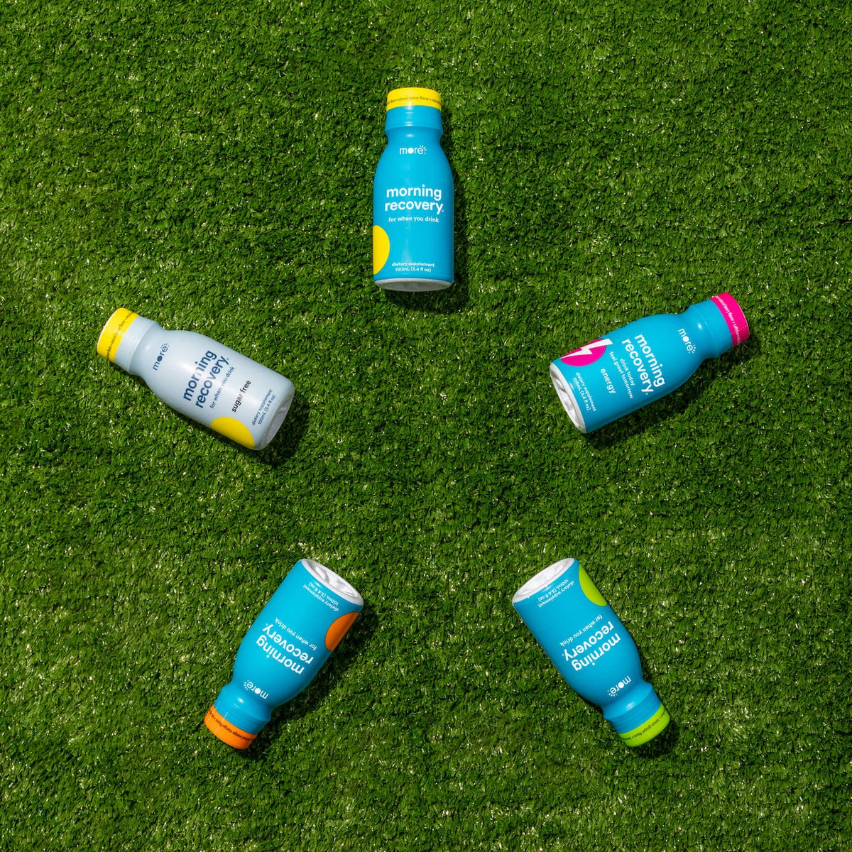 Morning Recovery Bottles on grass