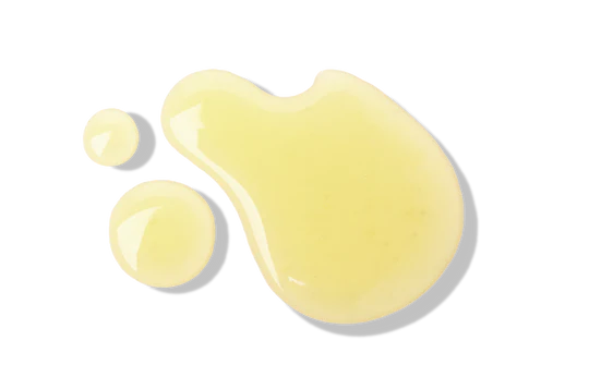 Yellow electrolyte liquid droplets isolated on a transparent background.
